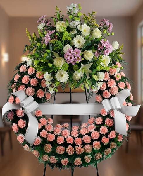 Corona Funeraria de tonos rosados